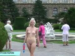 Slender blonde Lucy shows her naked body in public places